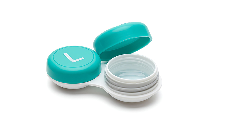 Contact lens case with lid open.