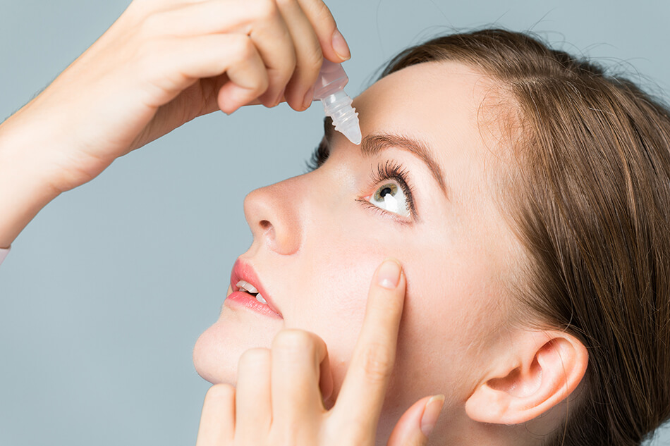 Using eye drops